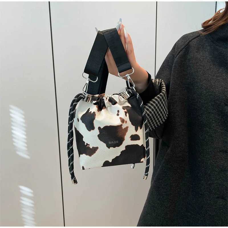 New Womens Mini Leopard Crossbody Bag Pu Leather Bucket Bag Drawstring Shoulder Bag Wide Strap Womens Bags Large Storage Bags XJ250604