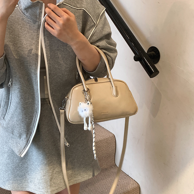 designer Korean Style Simple Handheld Bowling Ball Bag for Women 2025 New Casual Crossbody Bag Niche Commuter Shoulder Pillow Bag