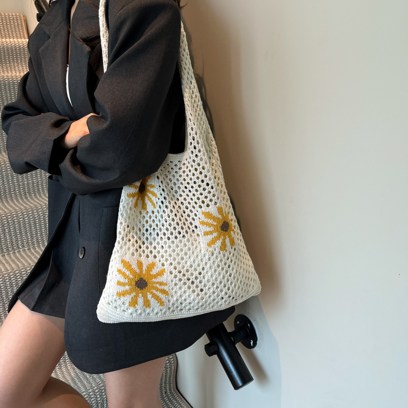 designer casual bag 2025 New Embroidered Women's Shoulder Bag Commuter Large Capacity Bag Knitted Bag Women's Woven Hollow Bag