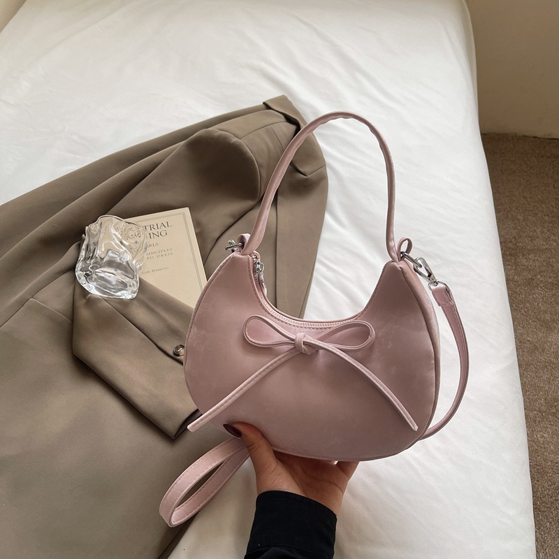 designer Minimalist Solid Color Bowknot Handheld Dumpling Bag for Women 2025 Summer New Casual Fashion Versatile Underarm Shoulder Bag