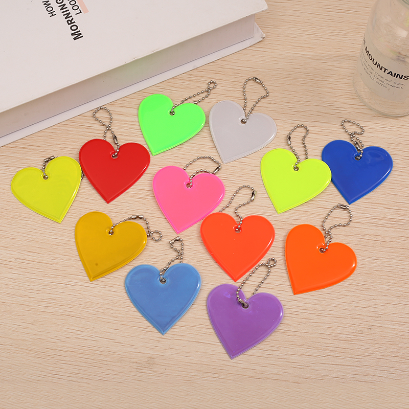 Creative Reflective Pendant for Backpacks - Safe Travel at Night with Multicolor PVC Glow-In-The-Dark Design