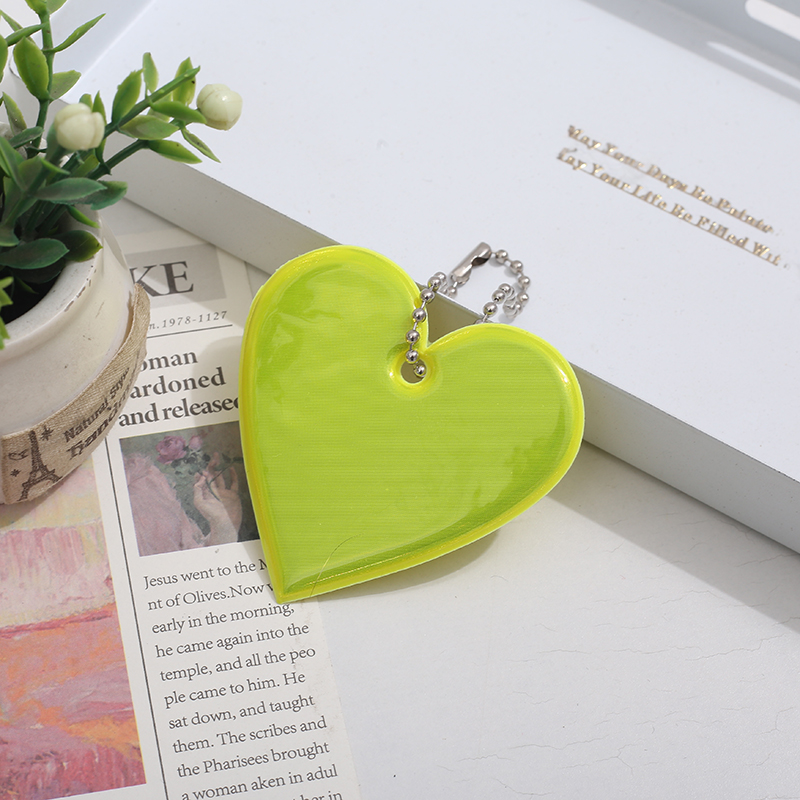 Creative Reflective Pendant for Backpacks - Safe Travel at Night with Multicolor PVC Glow-In-The-Dark Design