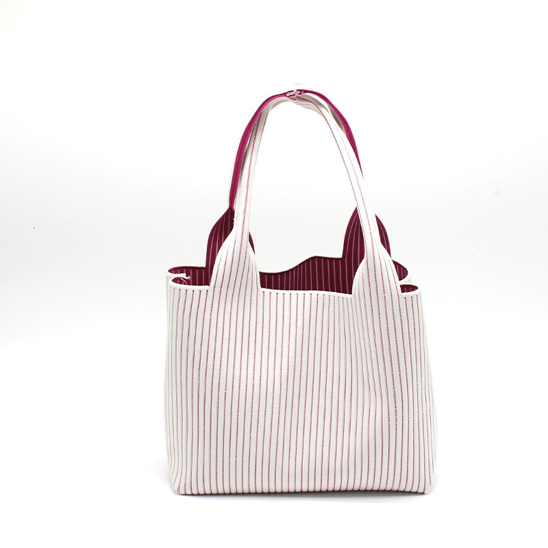 Customized Korean striped knitted large capacity casual knitted handbag designer women's new fashionable niche handbag
