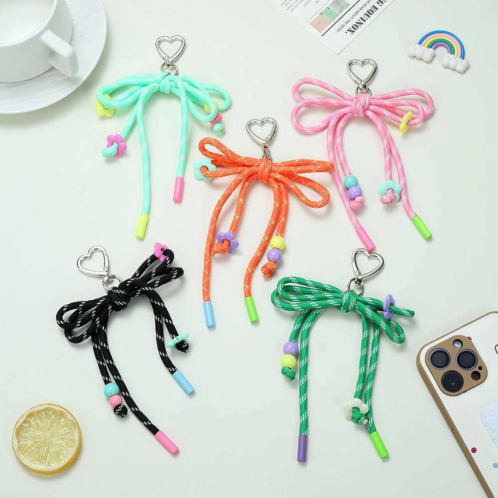 2025 Fashion New Colorful Hand Woven Bow Keychain Charming Heart Buckle Ring Small Flower Bead Bag Keychain Accessory W250604