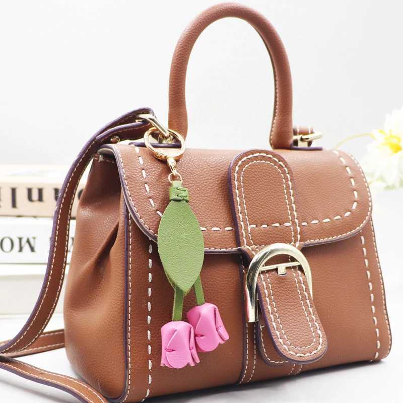 Popular Flower Shaped Pendant Rope Leather Metal Accessories Bag Pendant Keychain for women Hand Rope Gift Flower Bag Pendants W250604