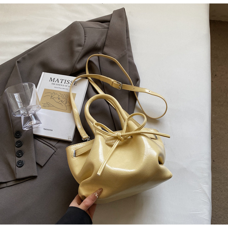 designer Korean Niche Handheld Basket Bag for Women Spring Summer 2025 New Trendy Fashion Bucket Bag with Bowknot Crossbody Bag