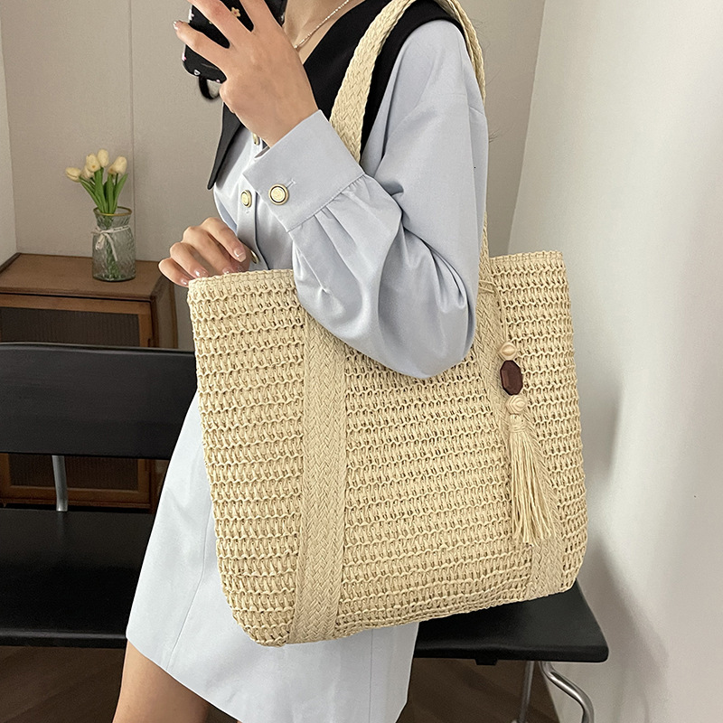 designer 2025 New Straw Beach Woven Handbag for Women with Tassels, Hollow Design, Large Capacity Tote Bag for Vacation