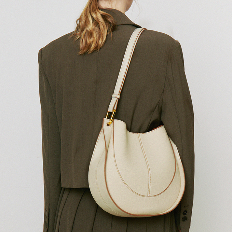 Top layer cowhide crossbody bag, niche light luxury women's bag designer, new trend single shoulder saddle bag, single shoulder bag