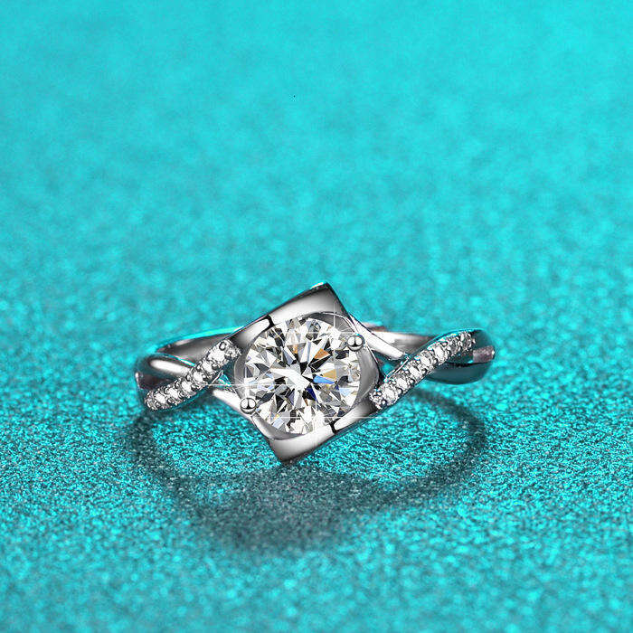 DHCollections Pure Sier Women's Ring Twist Arm Micro Pave Angel Kiss Proposal Moissanite