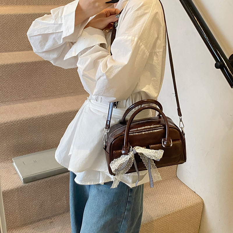 designer Casual Handheld Boston Bag for Women 2025 New Korean Version Simple Versatile Bowknot Single Shoulder Crossbody Bag