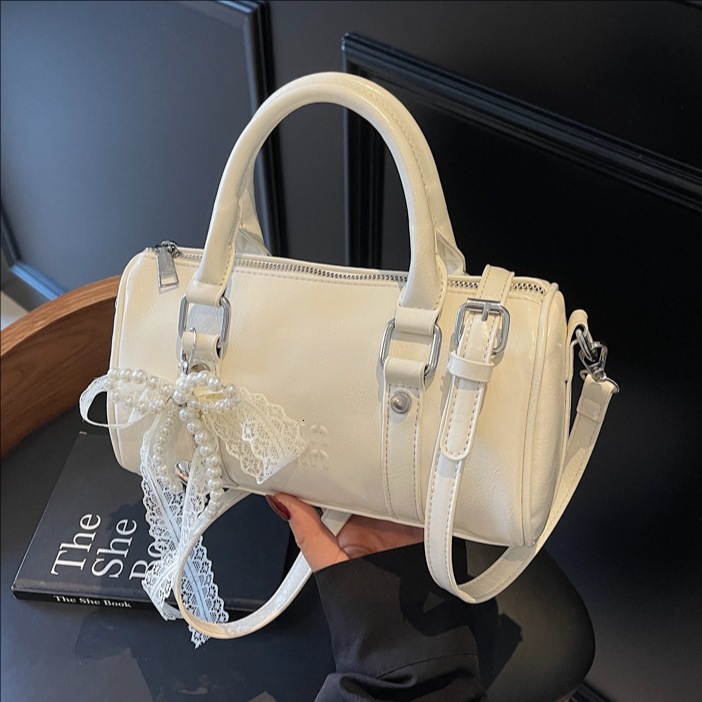 designer 2025 New Fashionable Elegant Versatile Handheld Cylinder Bag for Women Oil Wax Leather Commuter Crossbody Bag Solid Color Crossbody Bag