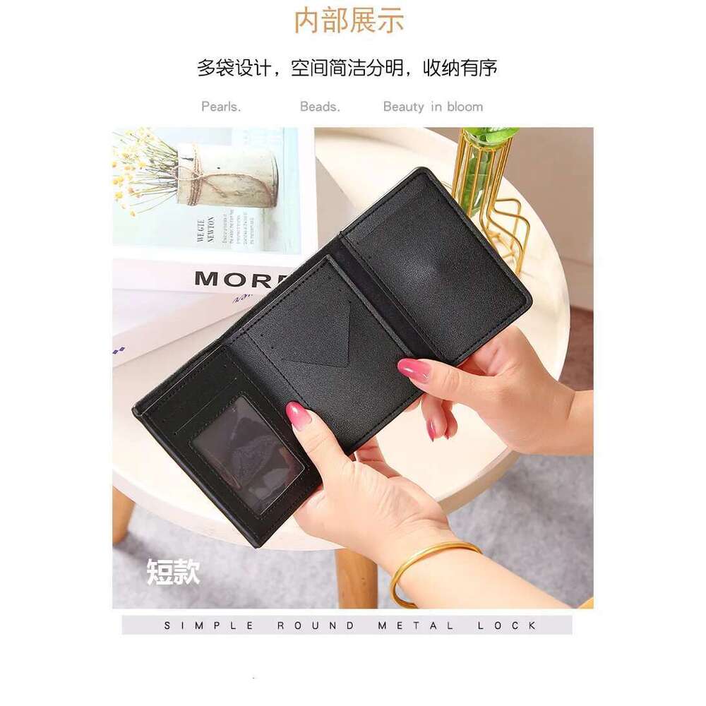 Popular women's purse Europe and the United States retro fashion style canvas thousand bird check short buckle folding han