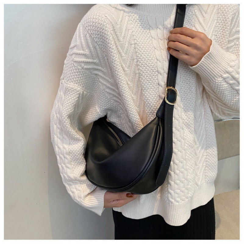 New women's four season bag with simple and multifunctional design, niche office commuting shoulder width dumpling bag designer shoulder bag