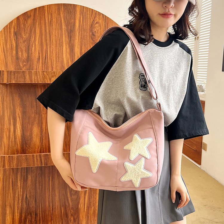 New cute crossbody bag with niche design, multifunctional shoulder bag, simple commuting, large capacity shoulder bag