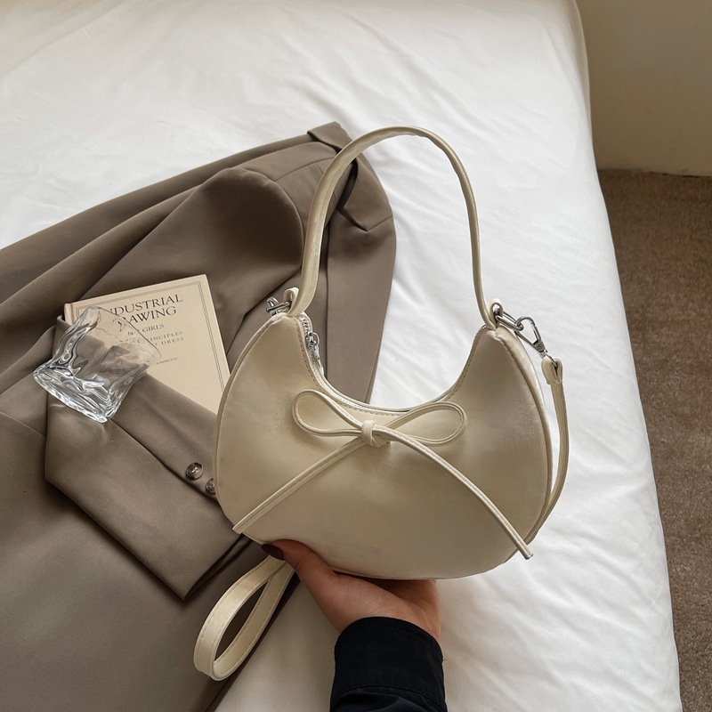 designer Minimalist Solid Color Bowknot Handheld Dumpling Bag for Women 2025 Summer New Casual Fashion Versatile Underarm Shoulder Bag