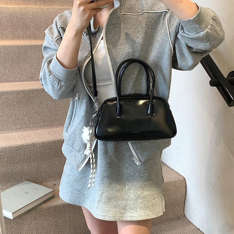 designer Korean Style Simple Handheld Bowling Ball Bag for Women 2025 New Casual Crossbody Bag Niche Commuter Shoulder Pillow Bag