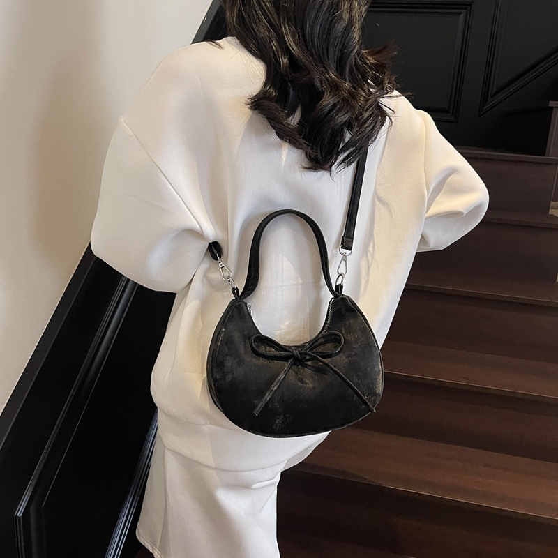 designer Minimalist Solid Color Bowknot Handheld Dumpling Bag for Women 2025 Summer New Casual Fashion Versatile Underarm Shoulder Bag