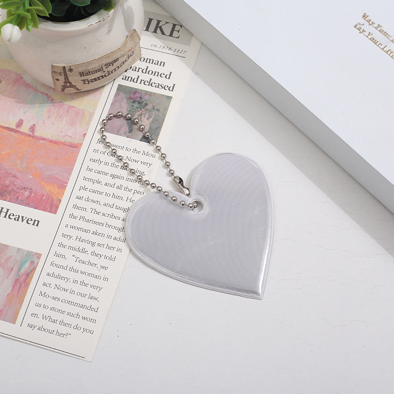 Creative Reflective Pendant for Backpacks - Safe Travel at Night with Multicolor PVC Glow-In-The-Dark Design