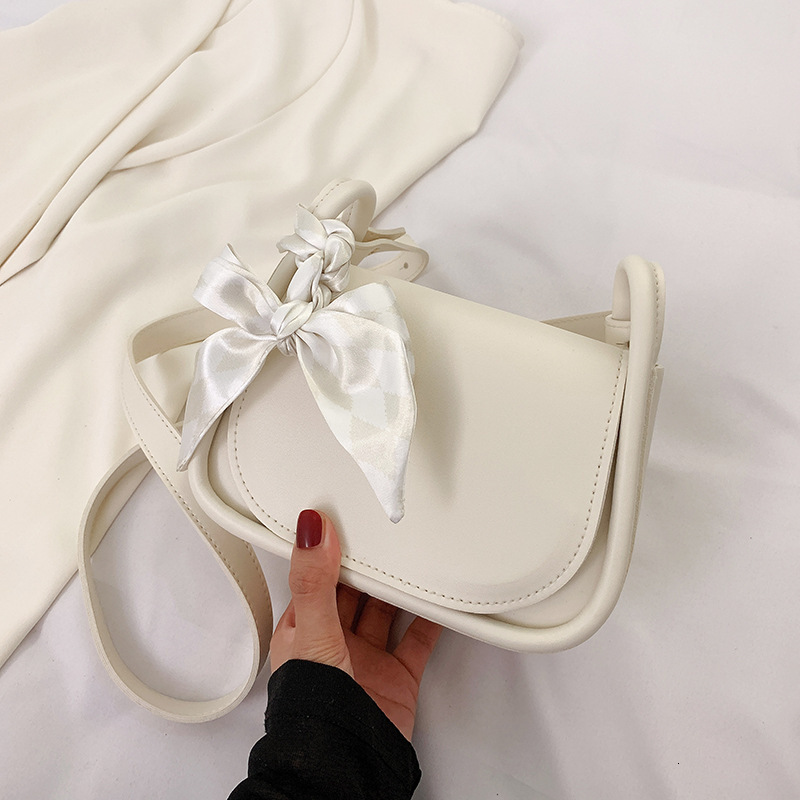 Fashionable autumn Korean style niche design candy colored small square bag popular mini mouth red envelope designer shoulder bag