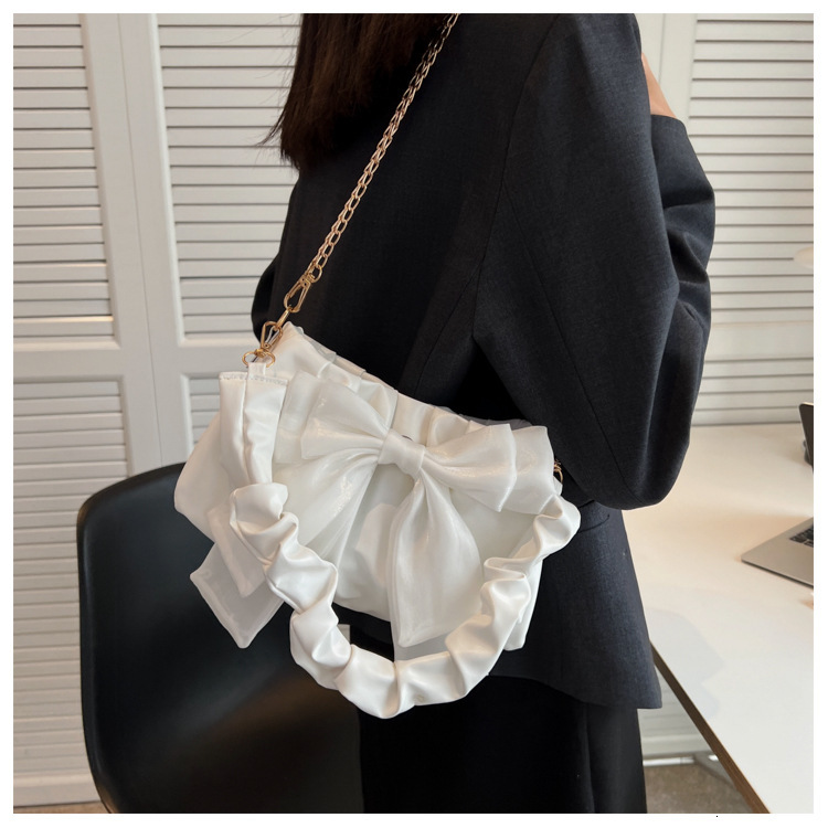 High quality brand new high-quality free designer bag bow tie new chain shoulder and armpit bag multifunctional pleated sloping body brand new free de