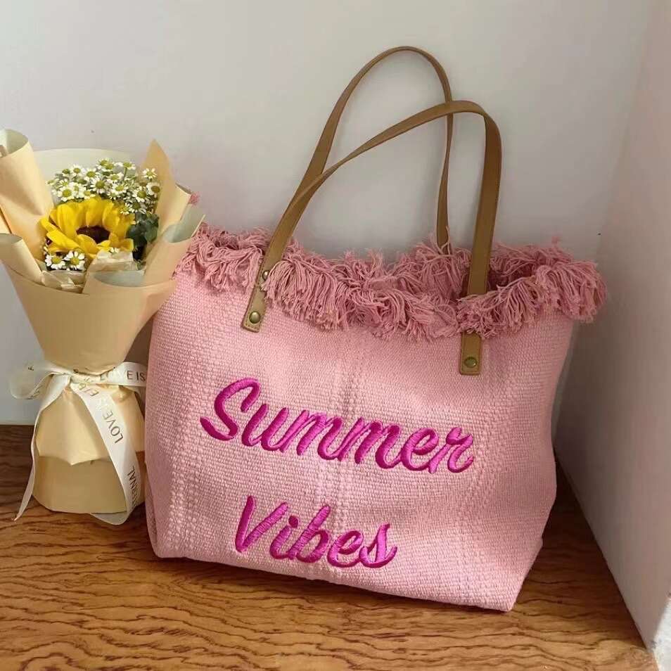 2025 New Korean Style Letter Tassel Canvas for Women Large Capacity Simple Commuter Student Shoulder Tote Bag