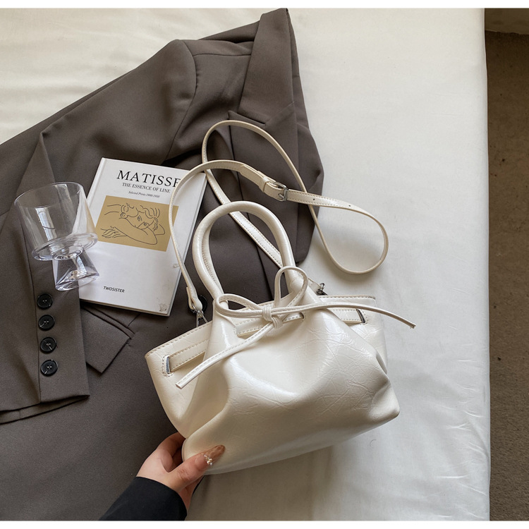 designer Korean Niche Handheld Basket Bag for Women Spring Summer 2025 New Trendy Fashion Bucket Bag with Bowknot Crossbody Bag