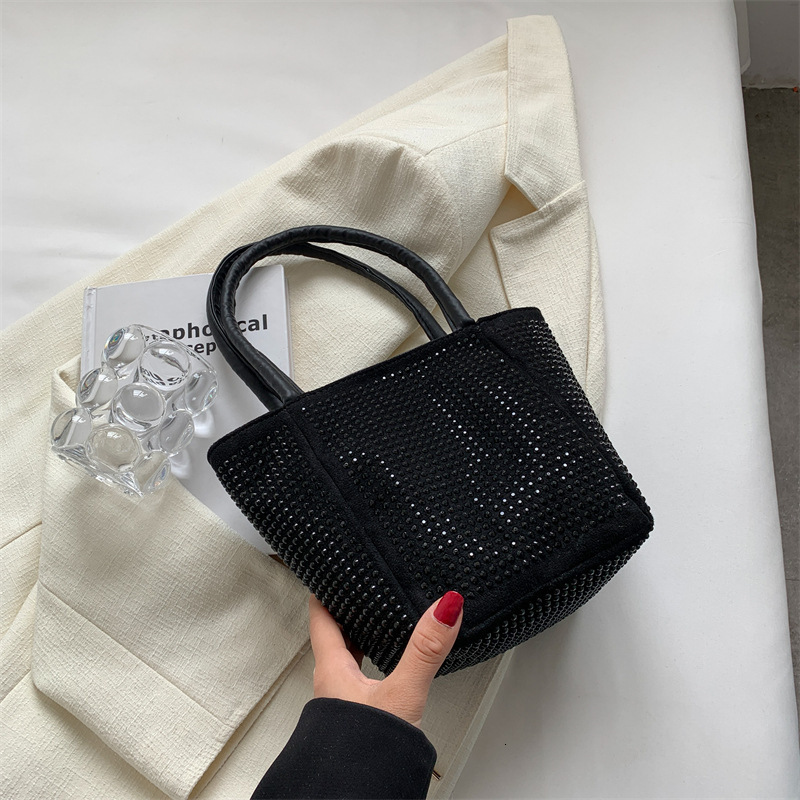 Top brand high-quality new free designer bag trendy flowing diamond chain bucket handbag elegant and casual shoulder width fashionable bag new free de