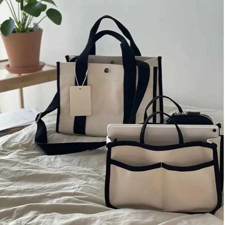 Korean Instagram Mommy Bag New Canvas One Shoulder Diagonal Straddle Bag Large Capacity Multi functional Mom and Baby Bag XJ250604