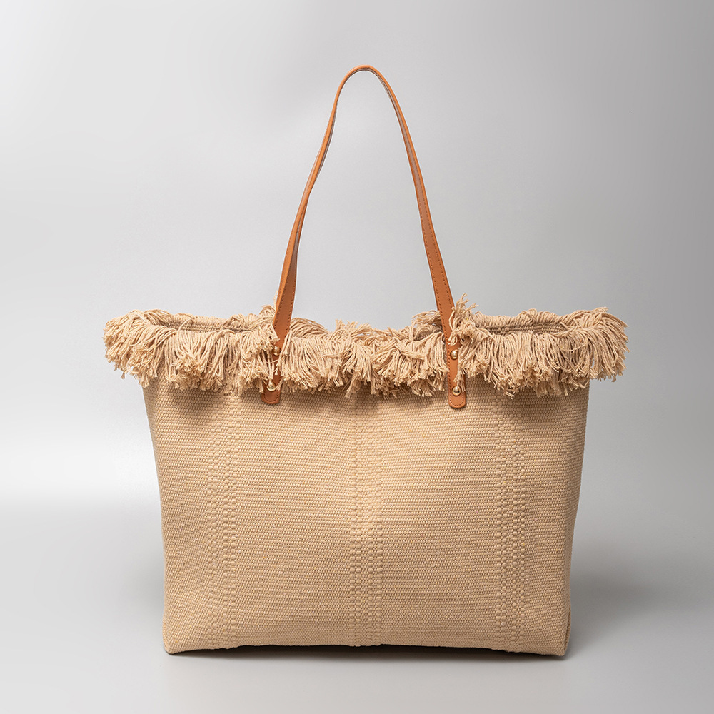 Cross border fashion large capacity canvas handbag women s shoulder bag new beach fashion bag designer women s fashionable crossbody bag