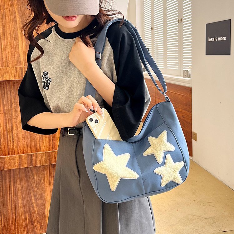New cute crossbody bag with niche design, multifunctional shoulder bag, simple commuting, large capacity shoulder bag