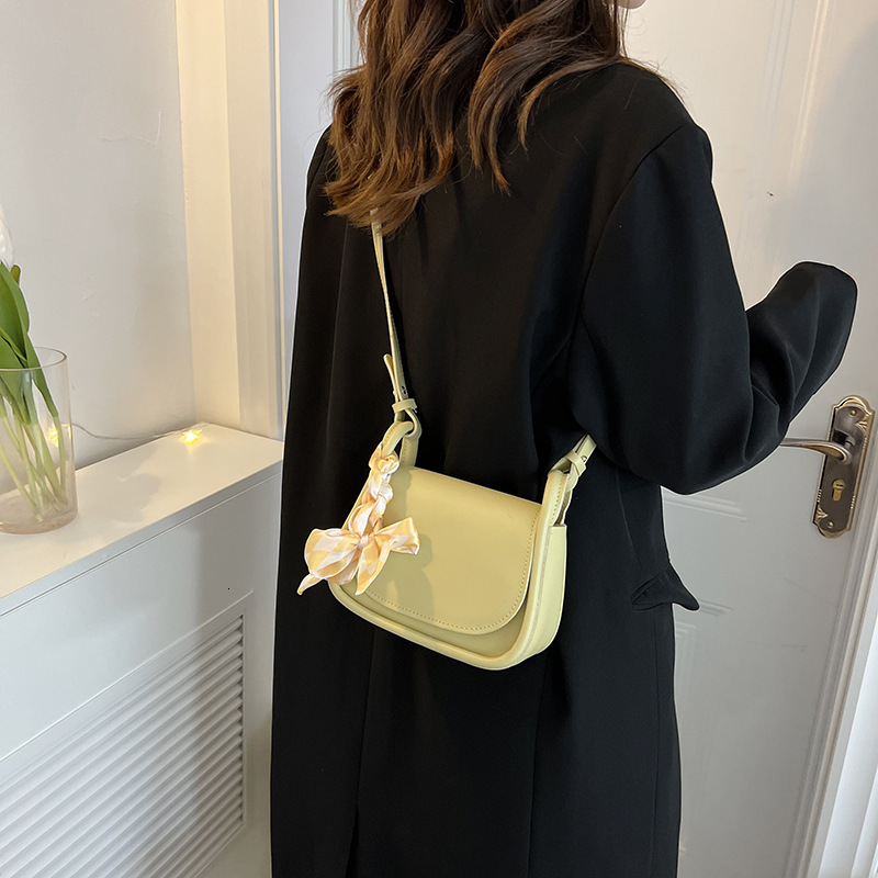 Fashionable autumn Korean style niche design candy colored small square bag popular mini mouth red envelope designer shoulder bag