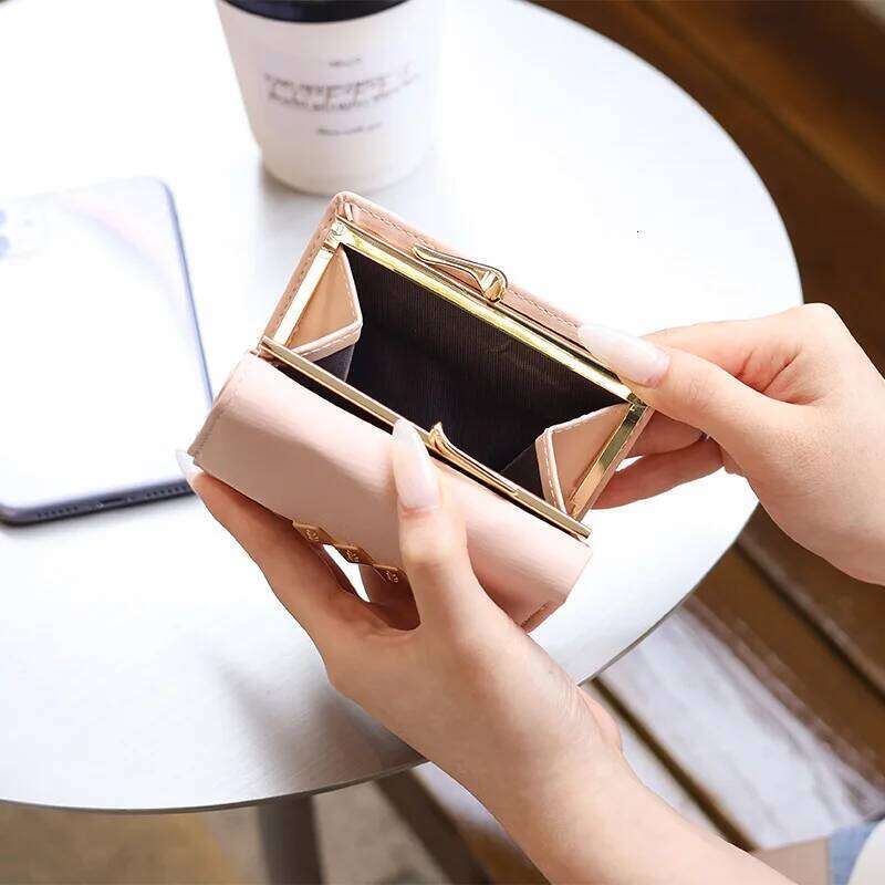 Autumn winter new women's short wallet Korean PU high texture iron frame printed small square bag simple and versatile stude