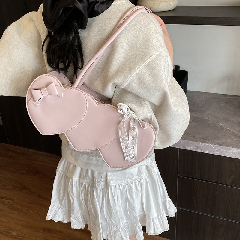 2025 New Niche Heart Bag Women Long Handbag Versatile Baguette Shopping Bag Designer Bag Spring Summer Free Shipping New Fashion Single Shoulder Bag