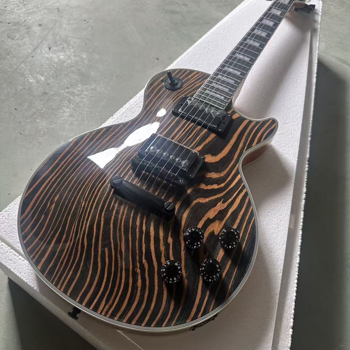 Artistically Tailored Zebra-Themed Electric Instruments from Master Craftspeople