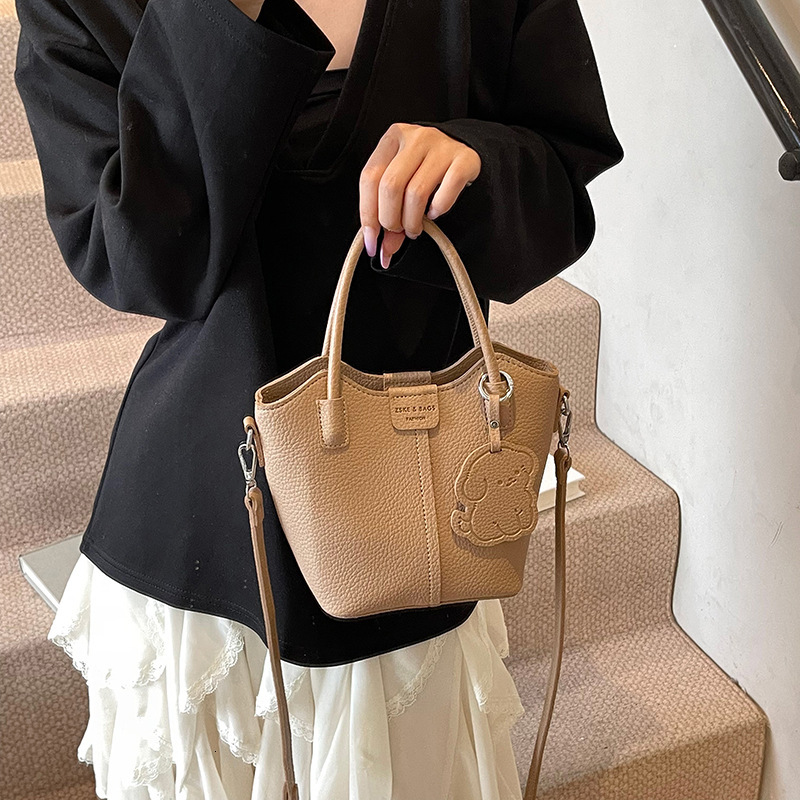 designer Niche Handheld Basket Bag for Women 2025 New Fashion Bucket Bag Simple Versatile Handheld Shoulder Crossbody Bag