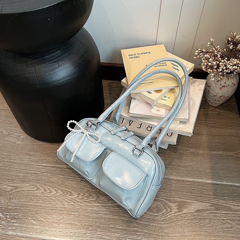 Korean style niche design fashion armpit Boston bag new popular handheld bowling bag large fashion capacity shoulder bag designer women s crossbody ba