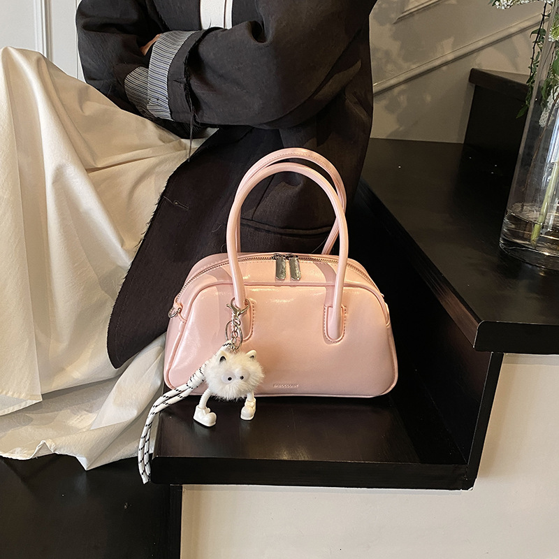 designer Korean Style Simple Handheld Bowling Ball Bag for Women 2025 New Casual Crossbody Bag Niche Commuter Shoulder Pillow Bag