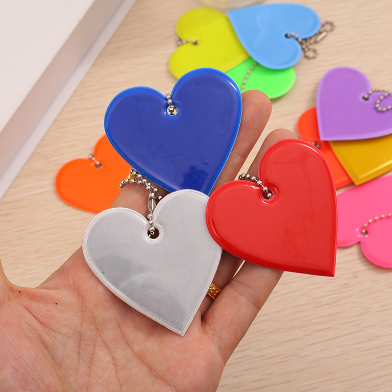 Creative Reflective Pendant for Backpacks - Safe Travel at Night with Multicolor PVC Glow-In-The-Dark Design