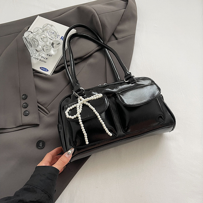 Korean style niche design fashion armpit Boston bag new popular handheld bowling bag large fashion capacity shoulder bag designer women s crossbody ba