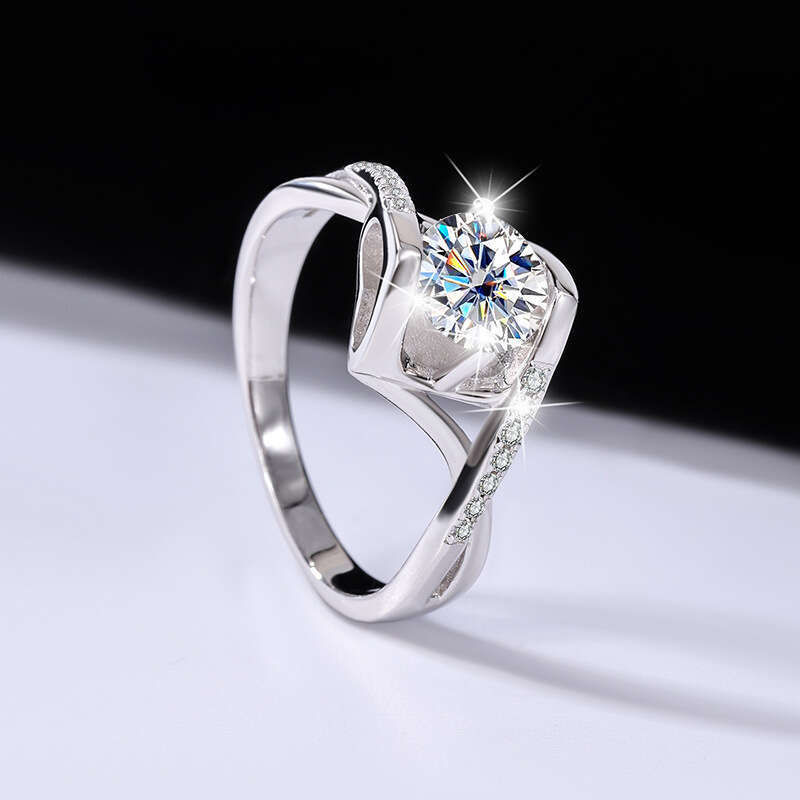 DHCollections Pure Sier Women's Ring Twist Arm Micro Pave Angel Kiss Proposal Moissanite