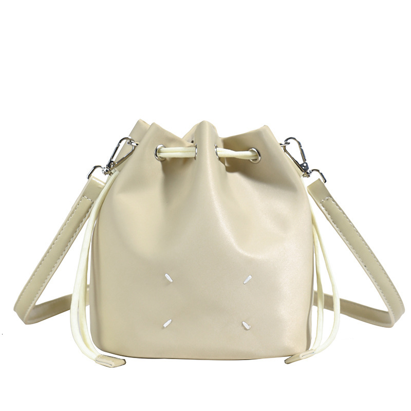 designer 2025 New Fashion Versatile High-End Drawstring Bucket Bag for Women Solid Color Niche Design Casual Shoulder Crossbody Bag