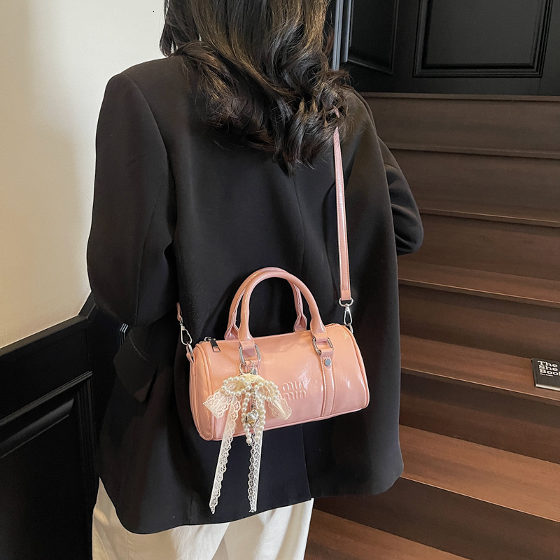 designer 2025 New Fashionable Elegant Versatile Handheld Cylinder Bag for Women Oil Wax Leather Commuter Crossbody Bag Solid Color Crossbody Bag