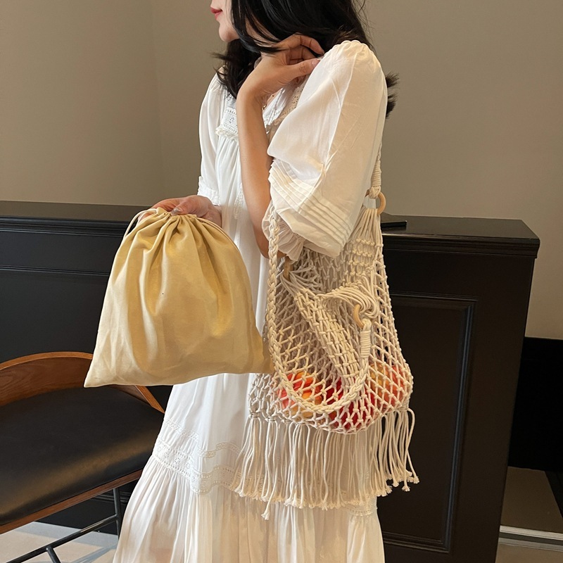 designer 2025 New Mesh Shoulder Underarm Bag Simple Woven Cotton Rope Bag Hollow Fishnet Bag Beach Vacation Tote Bag