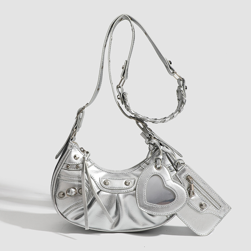 2025 New niche design rivet fashionable underarm bag multifunctional three in one handbag designer shoulder width round crescent bag