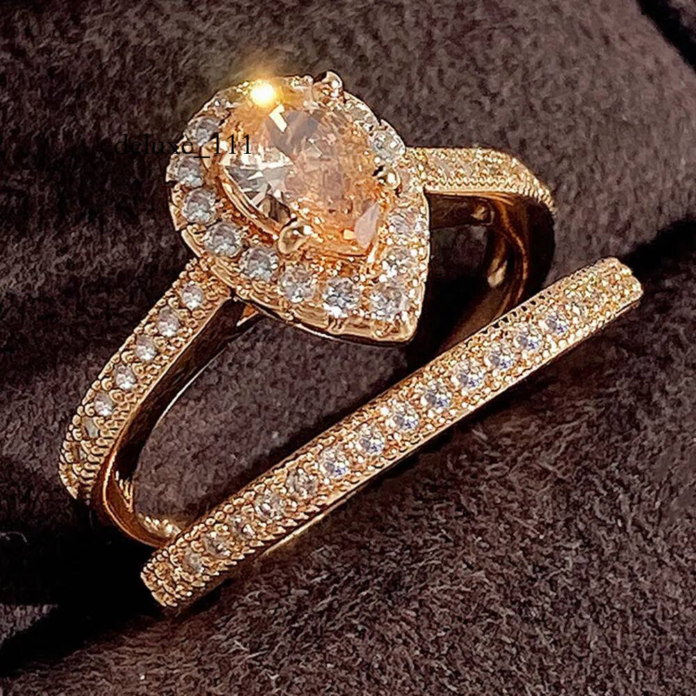 2024 Drop Ship Wedding Rings Jewelry Sterlig Sier Champagne Rose Gold Fill Pear Shape 5A Zircon CZ Dia Party Women Bridal Ring Set Gift