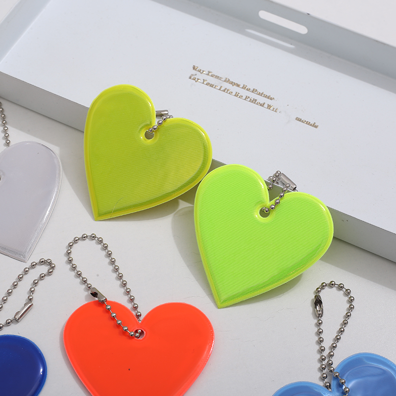 Creative Reflective Pendant for Backpacks - Safe Travel at Night with Multicolor PVC Glow-In-The-Dark Design