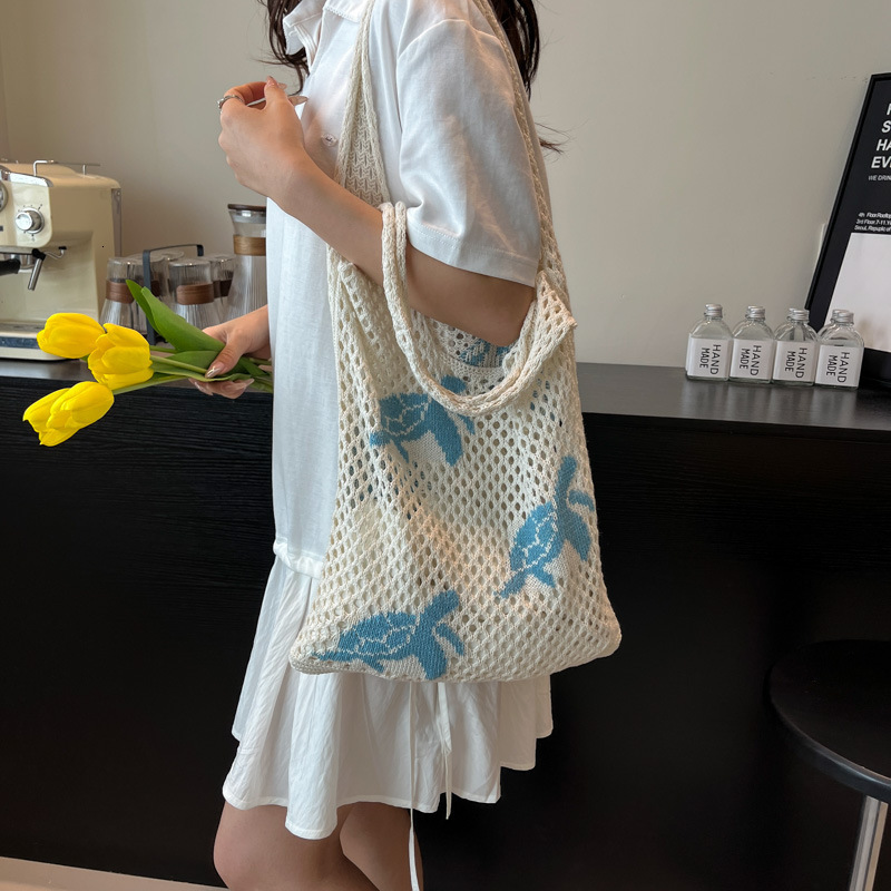 designer casual bag 2025 New Embroidered Women's Shoulder Bag Commuter Large Capacity Bag Knitted Bag Women's Woven Hollow Bag
