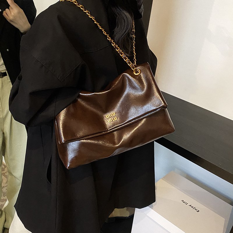 2025 mature stylish new women's tote bag with large capacity minimal design commuting chain bag