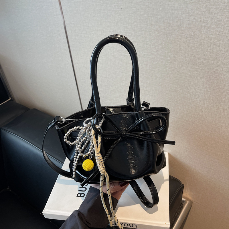 designer Korean Niche Handheld Basket Bag for Women Spring Summer 2025 New Trendy Fashion Bucket Bag with Bowknot Crossbody Bag