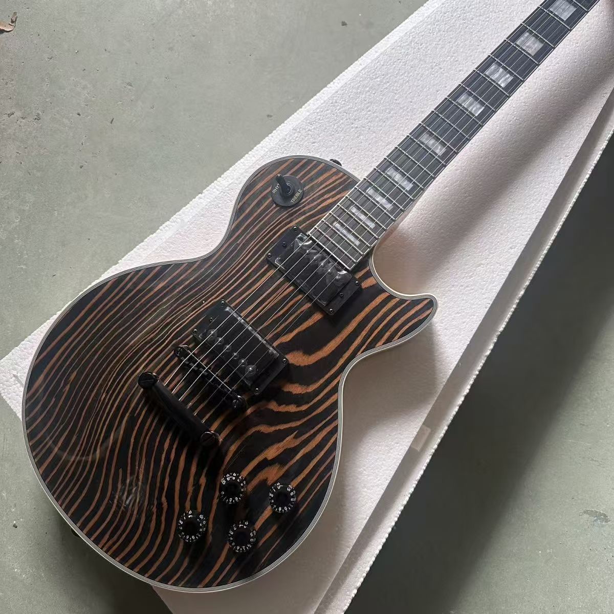 Artistically Tailored Zebra-Themed Electric Instruments from Master Craftspeople